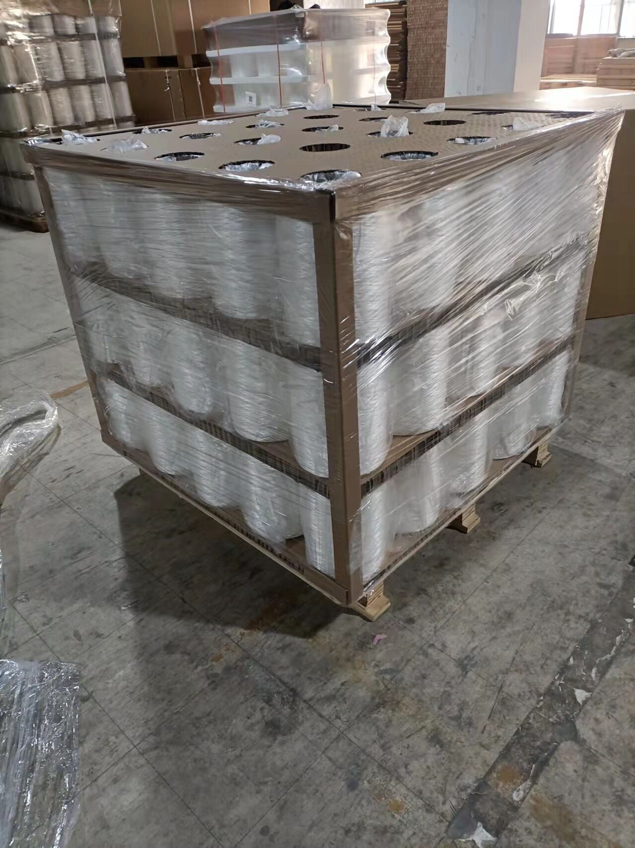 UHMWPE fiber spools used in high-performance sailcloth manufacturing